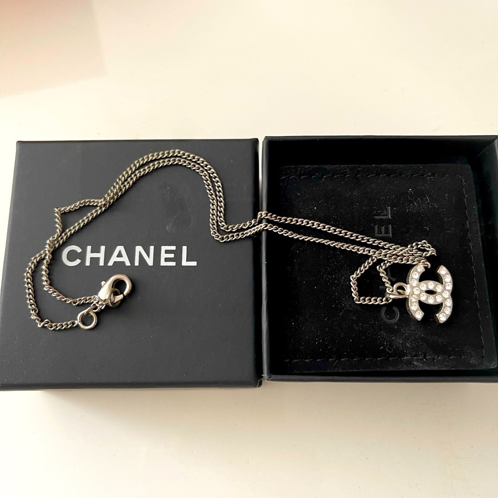 Authentic CHANEL logo CC necklace pre-owned mint condition no box